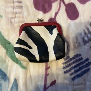 Used Dooney & Bourke cowhide print change purse